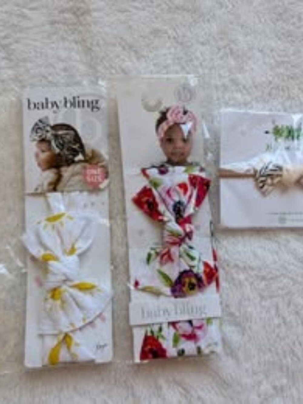 4 New with tags baby bows